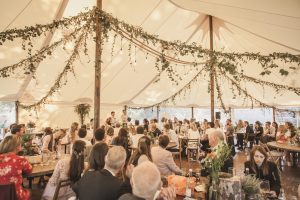 Floral Decorations inside a Traditional Wedding Marquee